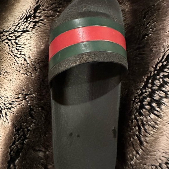 COPY - Like new Gucci slides. Only worn 10 times my son grew out of them
